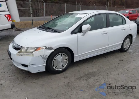 2009 Honda Civic Hybrid from USA, damaged, VIN JHMFA36259S002523